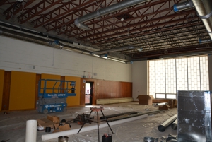 The cafeteria ceiling at Center Street is removed in preparation for new ductwork and new roof drains.