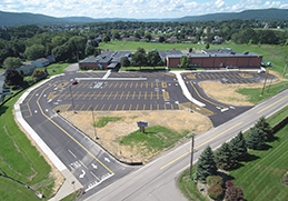 The parking lot at Gardner Road, which was at the end of its useful life, was completely replaced in Summer 2018 to create better traffic flow and a safer parking area for students, staff, and parents.